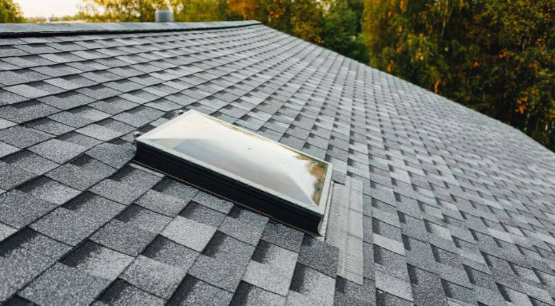 Asphalt shingle roof with a skylight