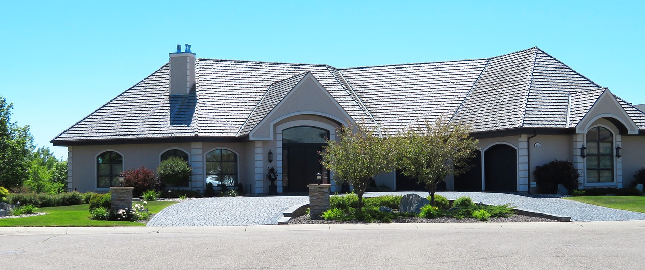 Bungalow with a paved driveway